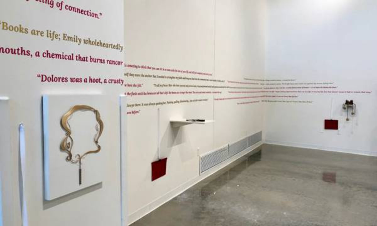 Calder Art Center student gallery with exhibited objects and text applied to the walls