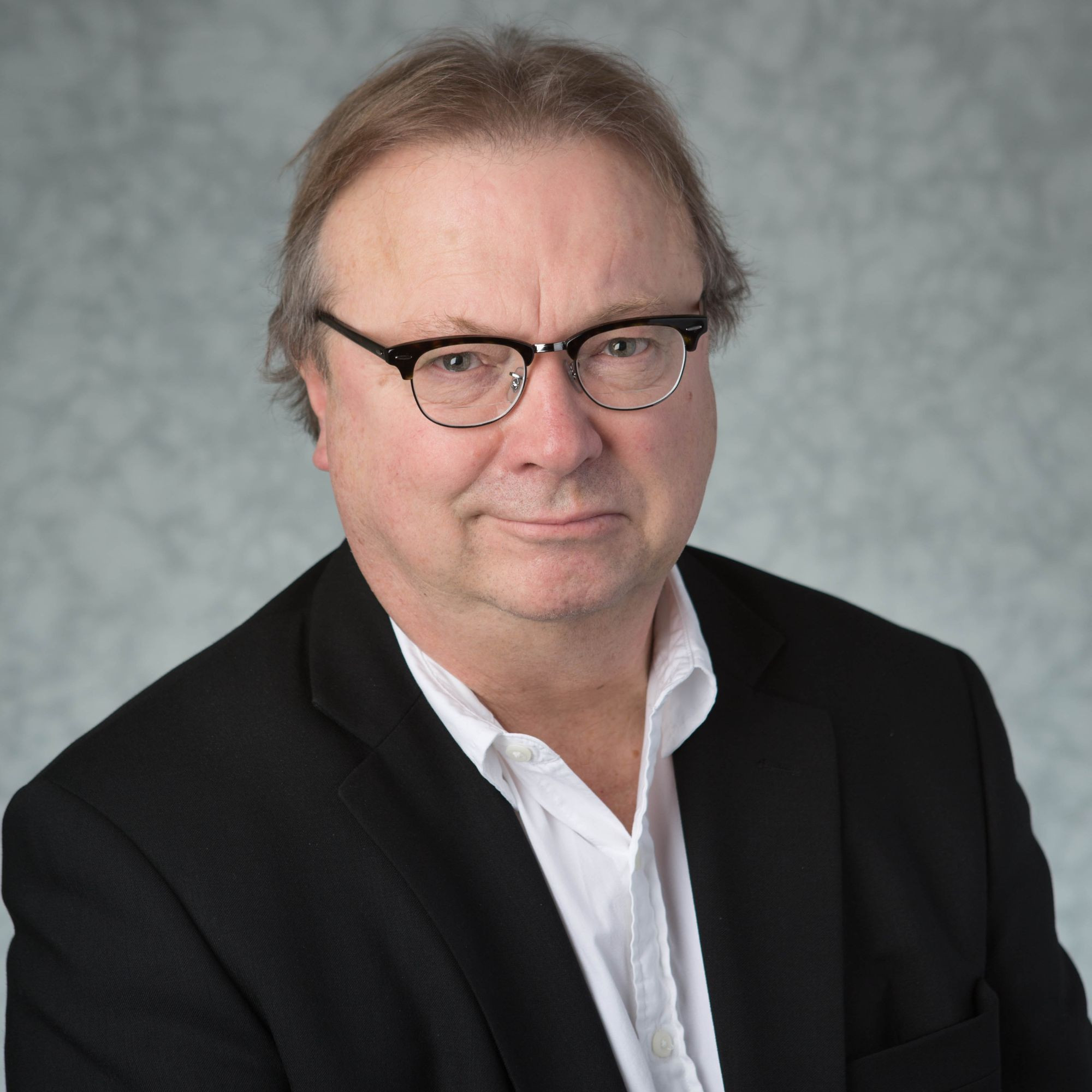 Head shot of author James Sanford