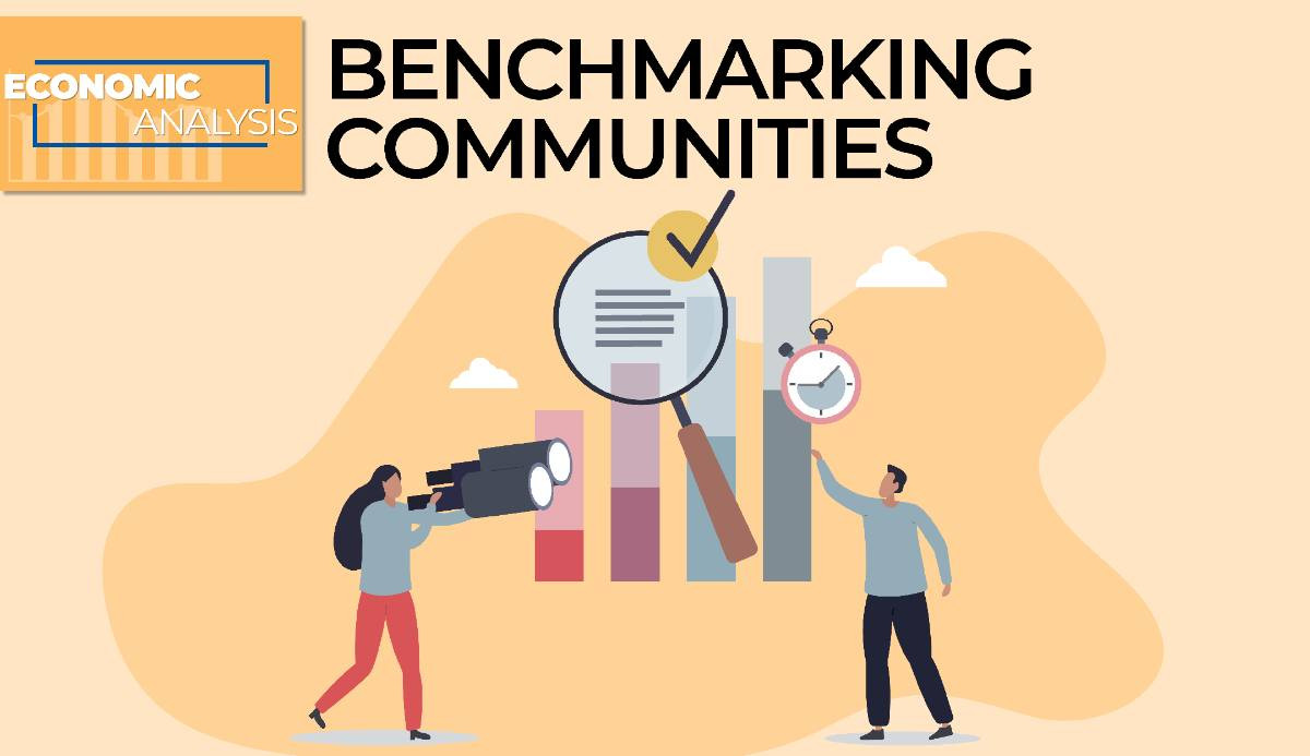 Image of two people investigating a data chart with the article title overhead that reads: Economic Analysis Benchmarking Communities