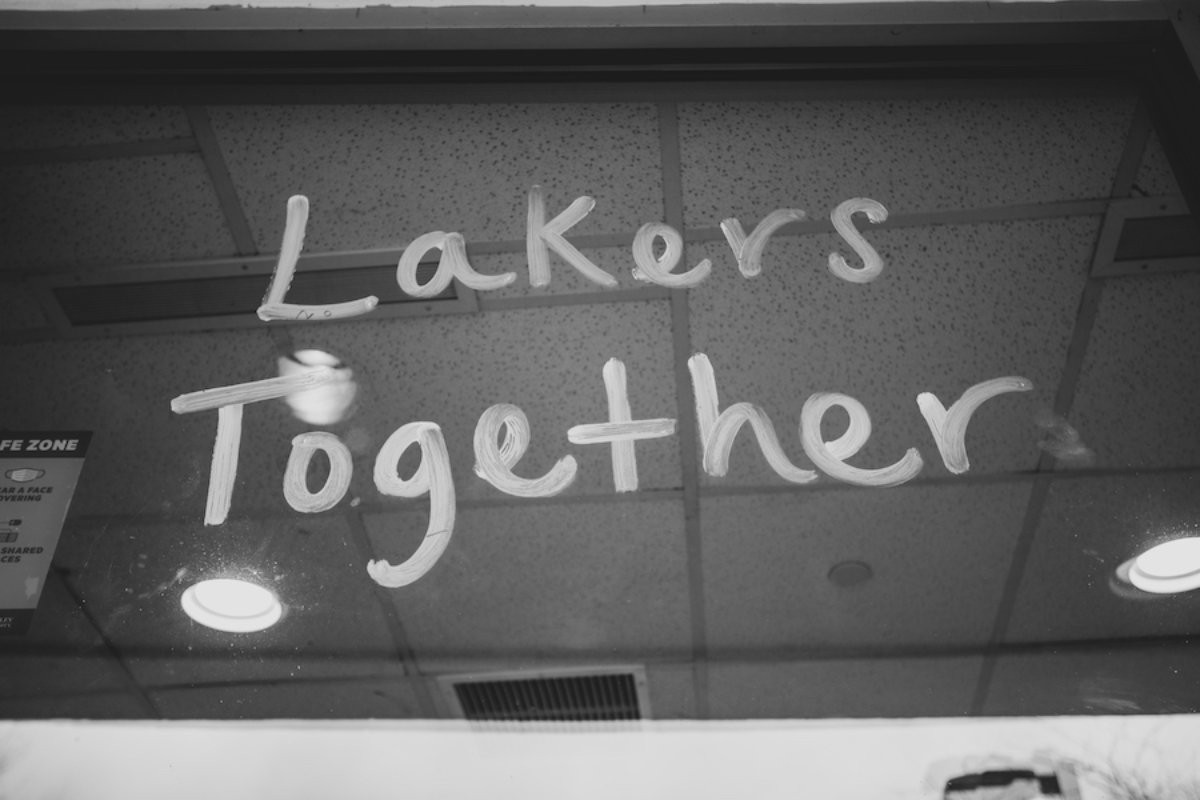writing on a window that reads Lakers Together