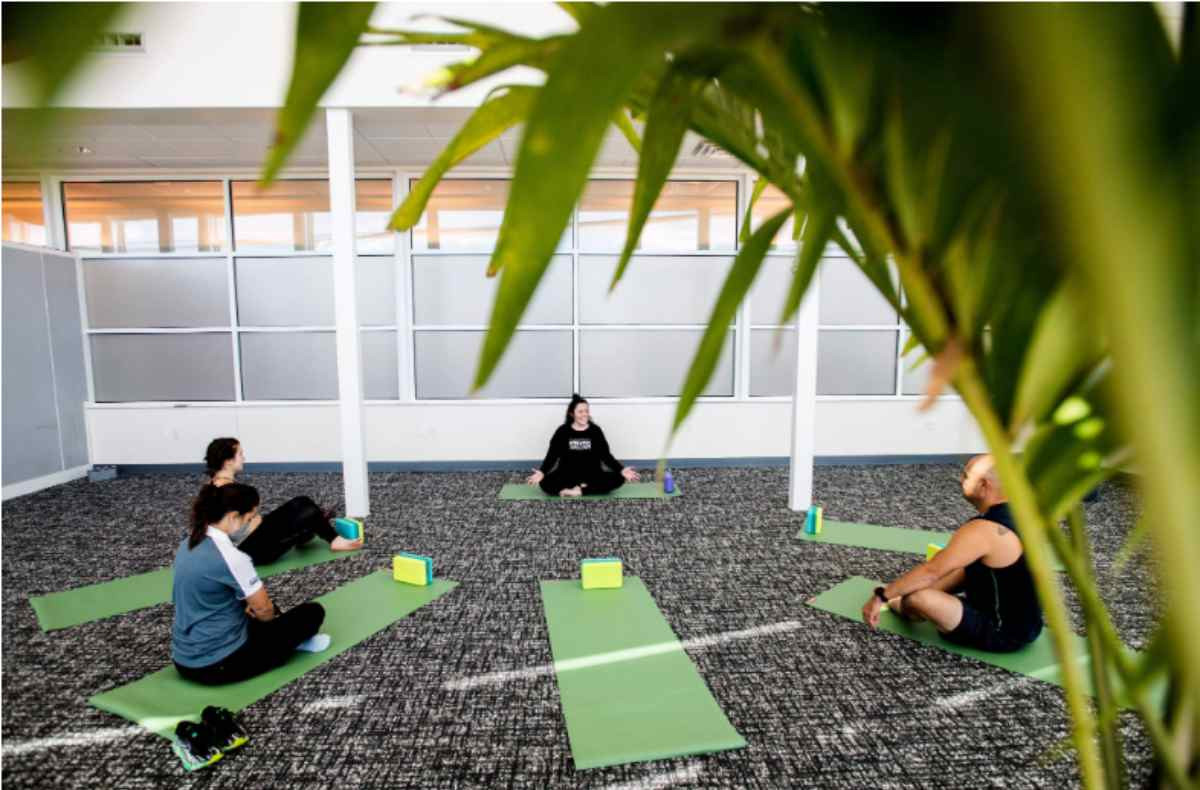 People doing yoga in the Reset Room