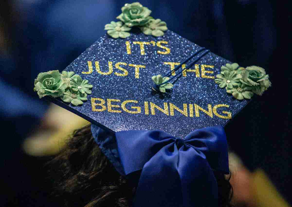 It's just the beginning on top of a graduation cap