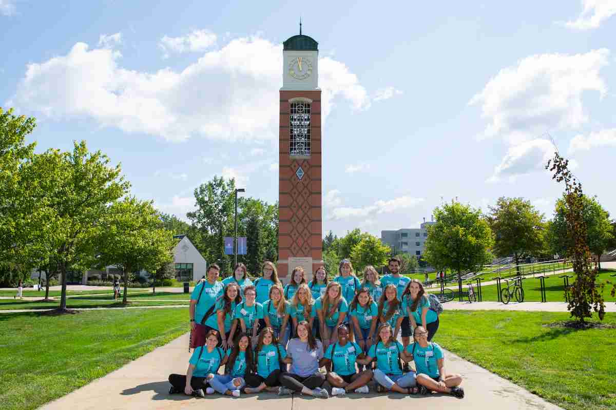 Transition Leaders taking a group photo in front of the clock tower