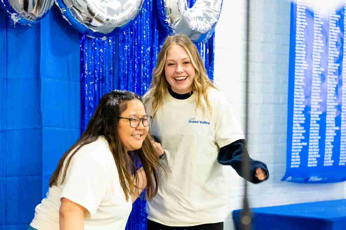 two students at I Am GV event laughing