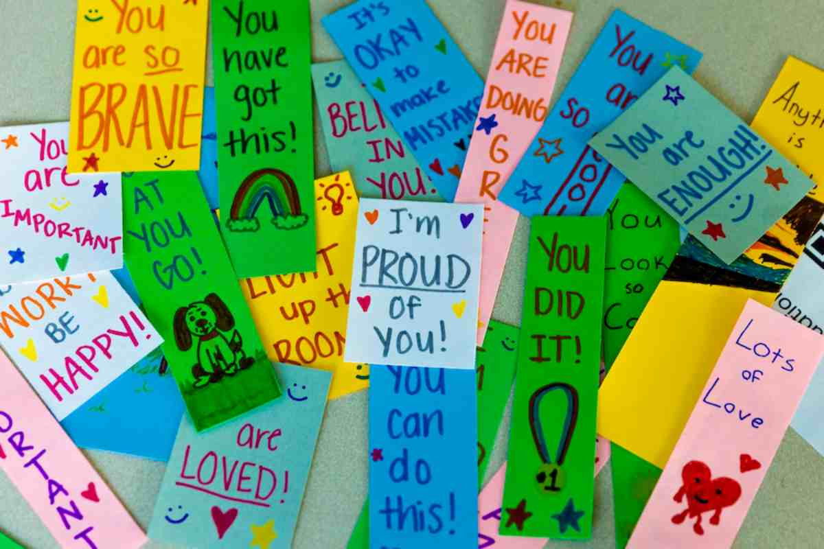 A bunch of colorful bookmarks that read: You did It, I'm Proud of You, You Can Do This, You are Enough, Lots of Love, You are So Cool. Its Okay to Make Mistakes, You Are So Brave, Look At You Go, Light Up the Room, You Are Important, Work Be Happy, Import