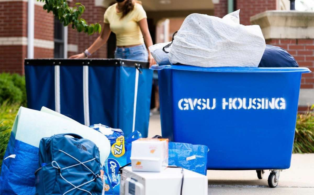 GVSU Housing moving bins full of students things