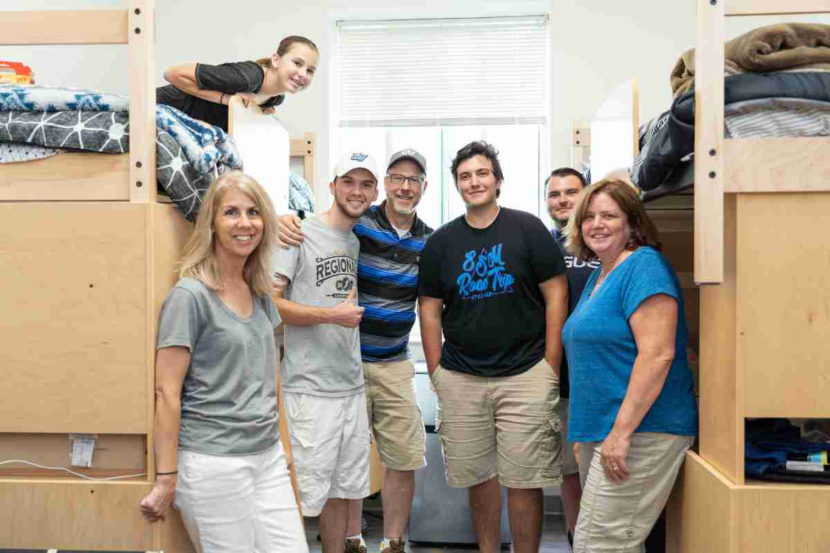 Parents with student moving into dorm
