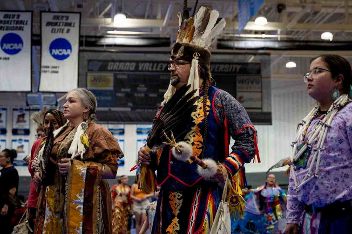 People dancing and celebrating Native American culture and community at the Pow Wow