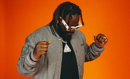 T-Pain with an orange backdrop