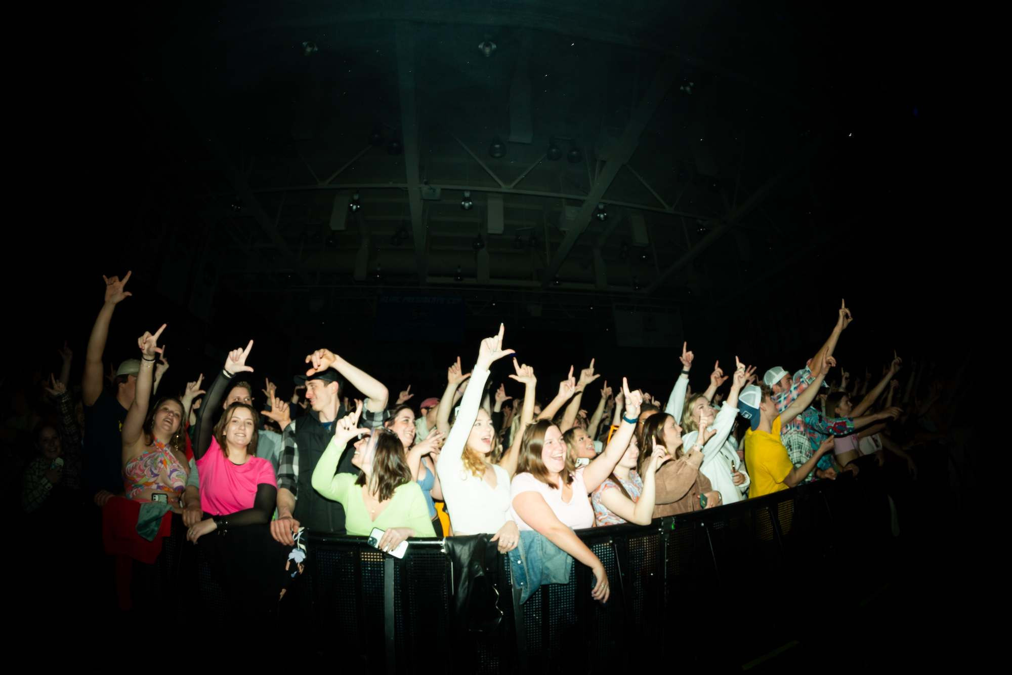 Crowd singing with the laker anchor up symbol