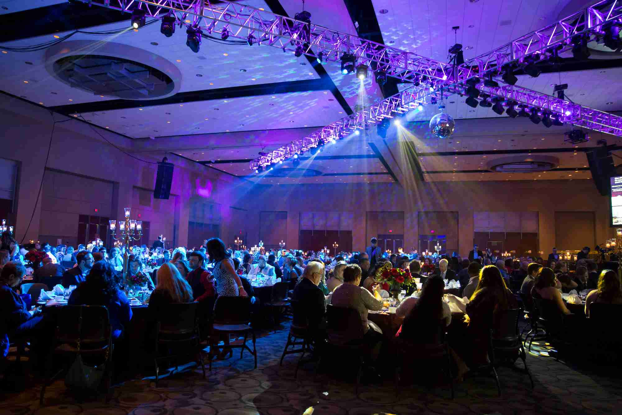 Attendants sitting at tables at the Pres Ball