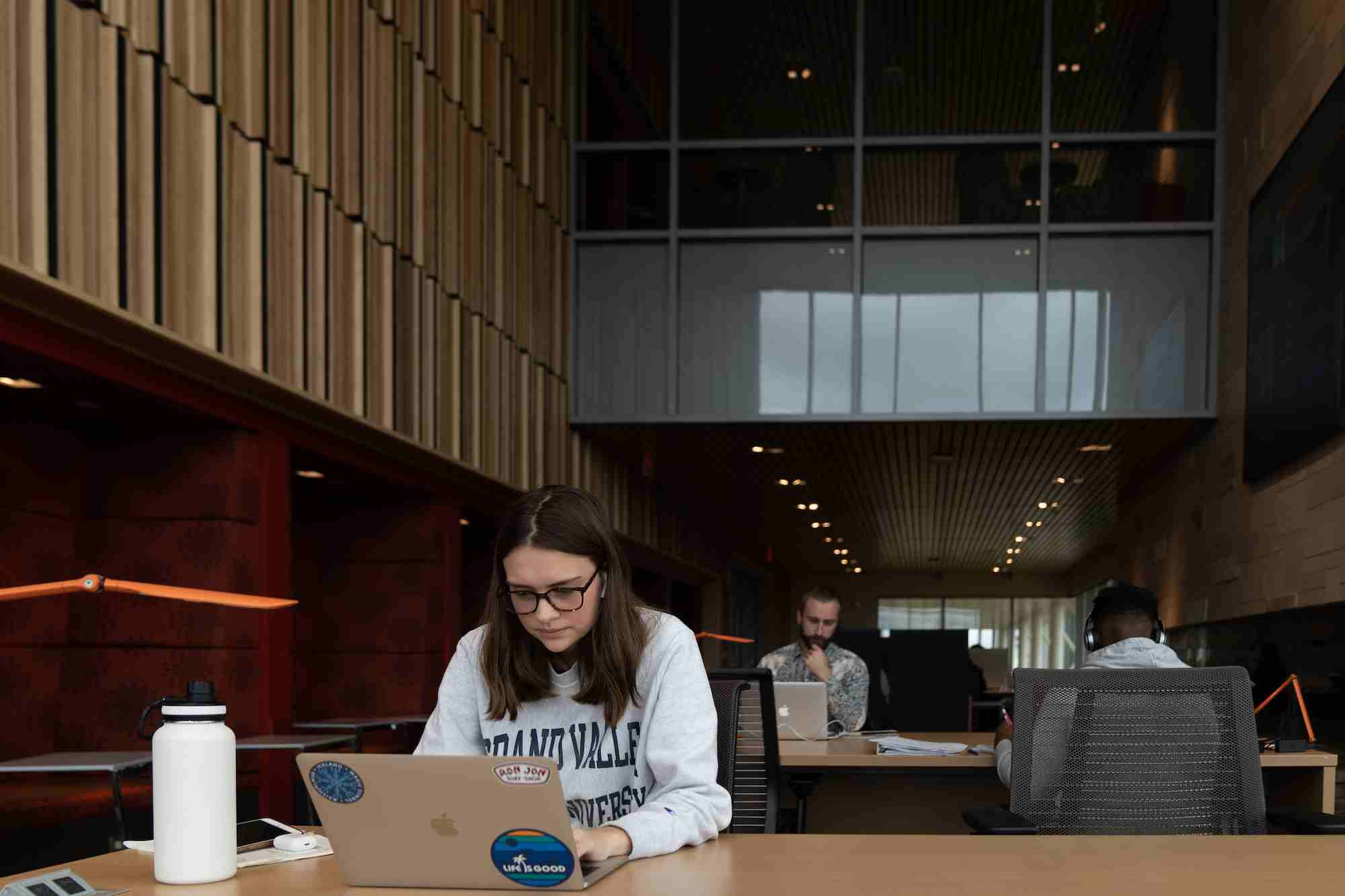 student in the library studying