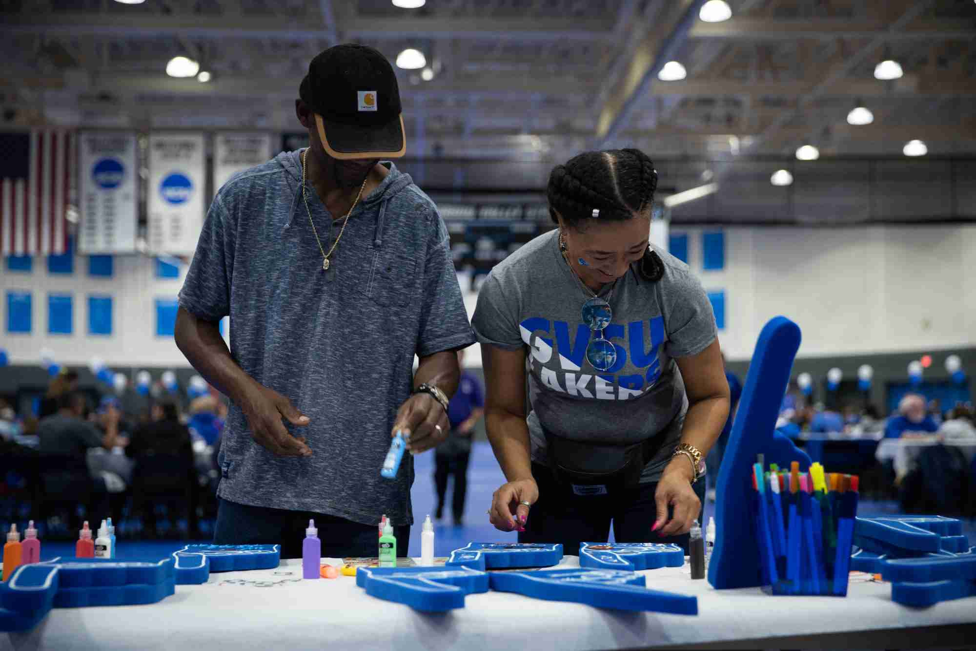 Parents working on a craft 