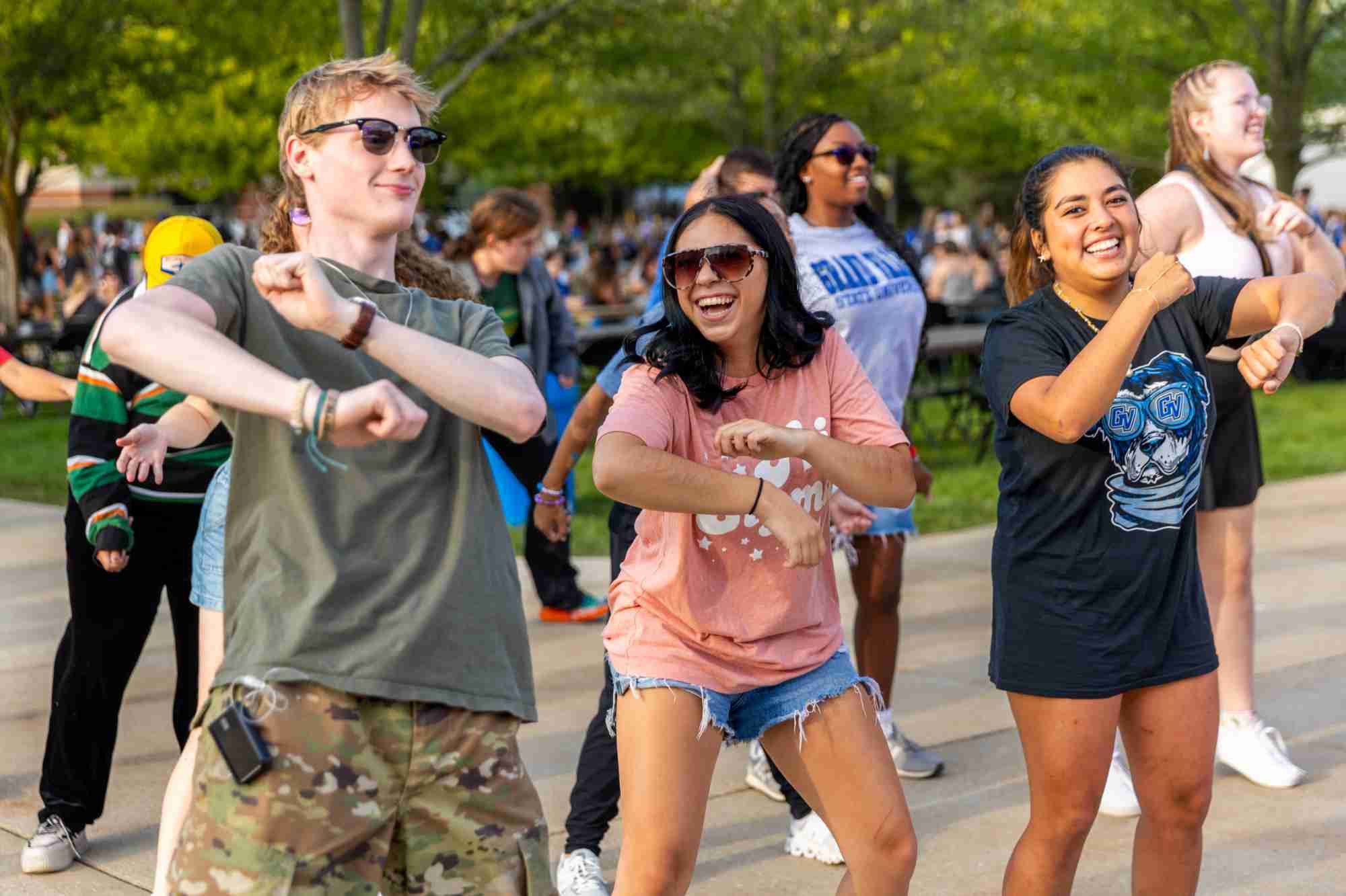 Friends dancing at Laker Kickoff during Laker Welcome Week