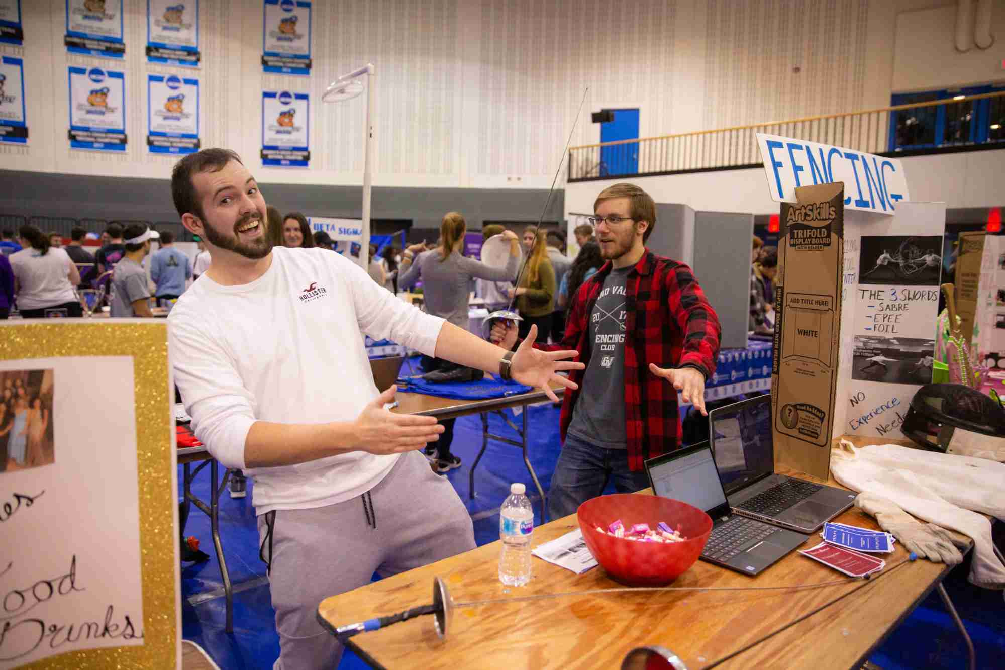 Students pretending to sword fight 