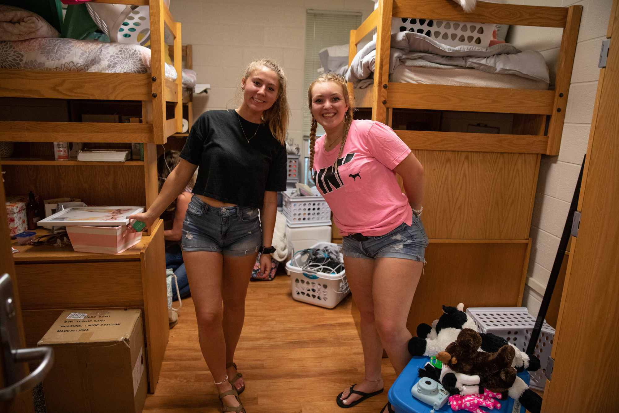 Students moving into their dorm room 