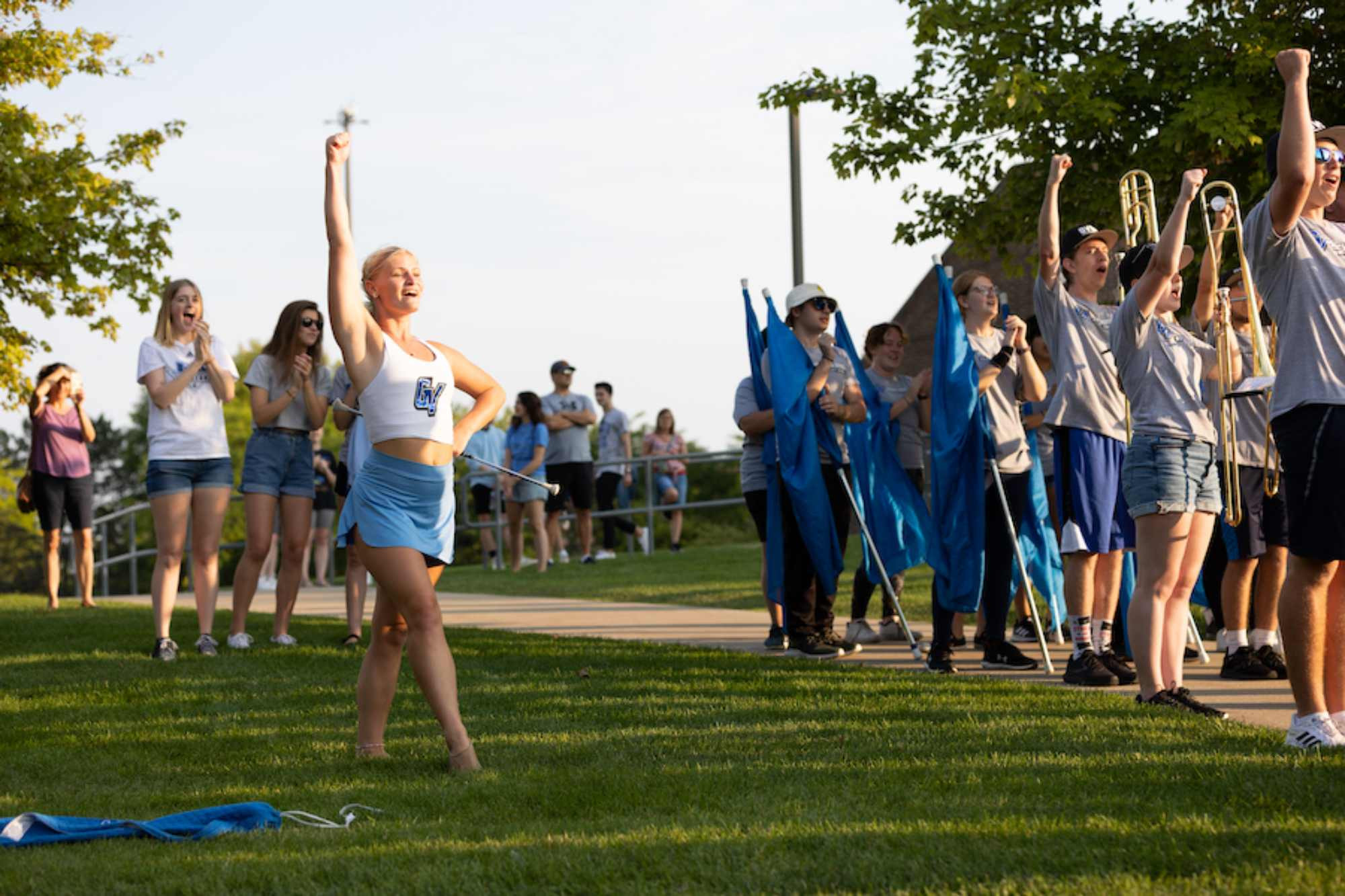 families watching the band and dance team