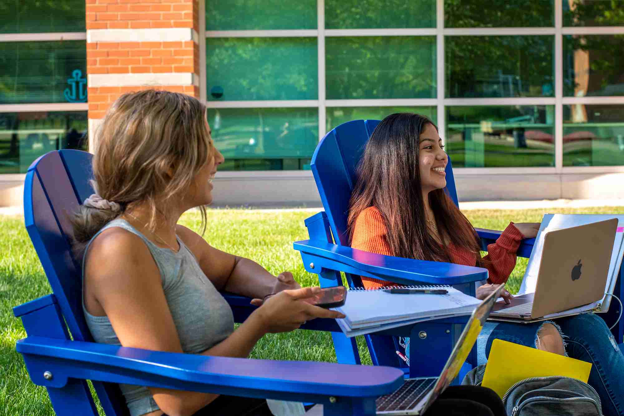 Students sitting on Allendale Campus and talking