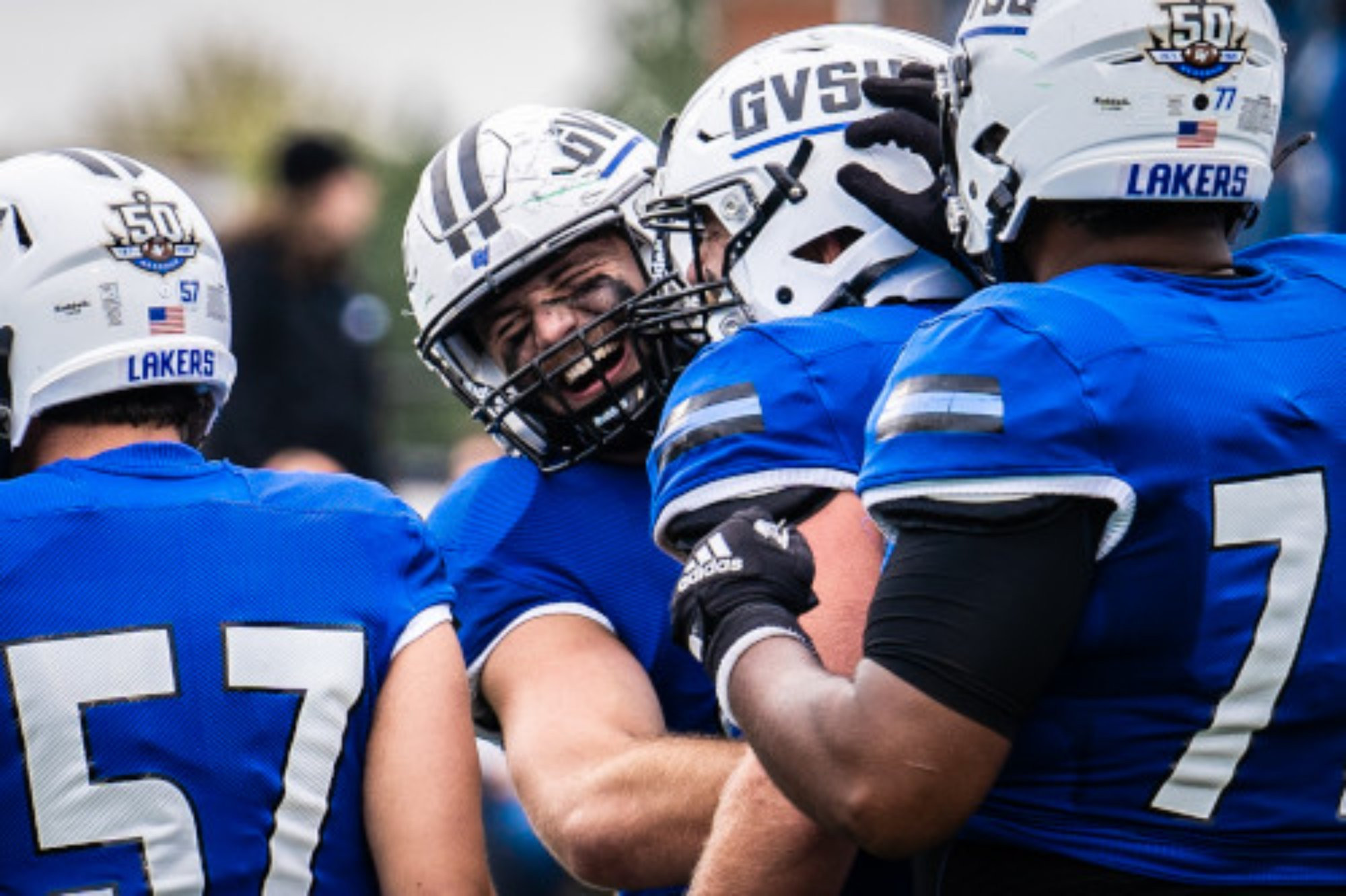 Football players hugging